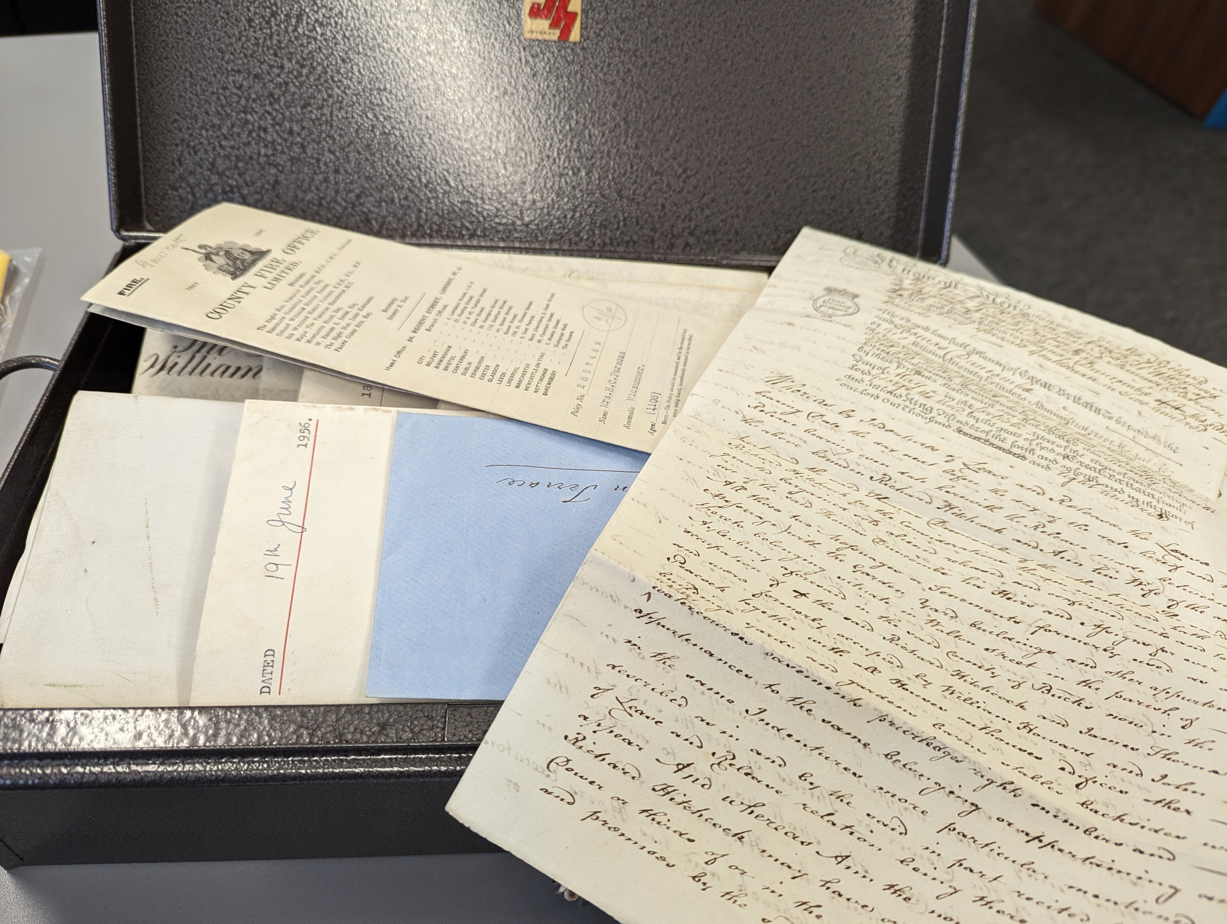 Carefully arranged documents ready for professional scanning